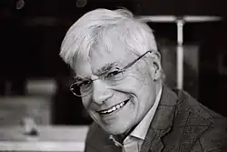 Ralph Allwood, MBE (born 1950), choral conductor, composer and Fellow Commoner advising in Music at Queens' College, Cambridge