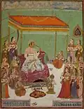 Rao Raja Bishan Singh of Uniara listening to musicians.