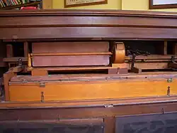 The interior of an 1895 Mason & Hamlin reed organ showing stop mechanism, swell case and Vox humana tremulant.