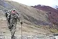 A Turkish scout scales Mt. Ljuboten during a Best Mountain Warrior Competition in 2021