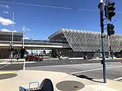 The newly elevated Reservoir railway station in the background.