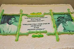 sheet cake with two black-and-white photos