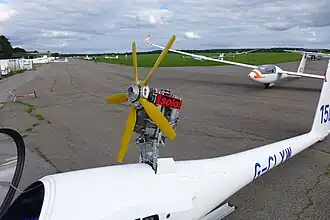 Retractable turbo two-stroke sustainer engine