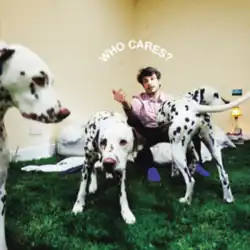 A photo of the artist in a beige room surrounded by dalmatian dogs, with the caption "Who Cares?" on the top.