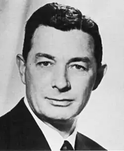 Man in a suit looking at the camera