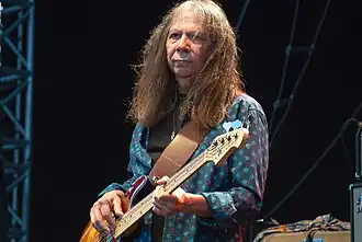 Rosas performing with Neil Young and Crazy Horse in 2014