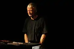 Robert Grenier speaking at Beyond Baroque Literary Arts Center, Los Angeles.