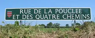 The road sign design in use in the parish. This is the longest road name in Jersey.