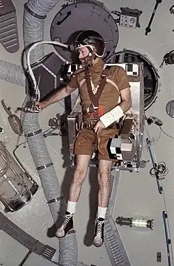 Commander Gerald Carr flies a Manned Maneuvering Unit prototype.