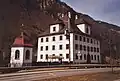 Station with Herrenhaus Grafenort in the background (2004)