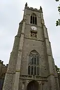 The fine Perpendicular-style tower, 130 feet tall