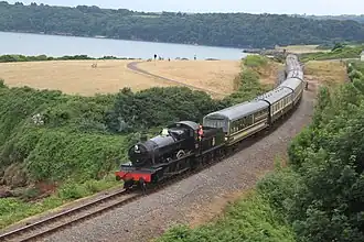 A train moving on the Dartmouth Steam Railway