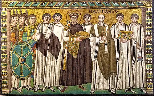 A mosaic showing Justinian with the bishop of Ravenna (Italy), bodyguards, and courtiers.