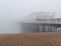 Sea fog or "fret" encroaching on Brighton Pier