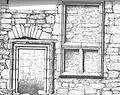 Window and armorial panelling over the entrance doorway