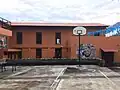 Side building and basketball court
