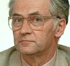 Three-quarter profile shot of Siegfried Thiele, a clean-shaven, middle-aged, white man with hair combed back.