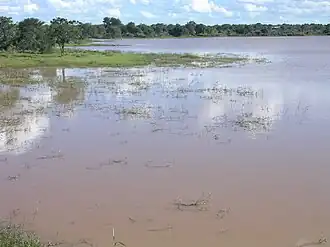 Dam at Silonga, buildings of the village in the background