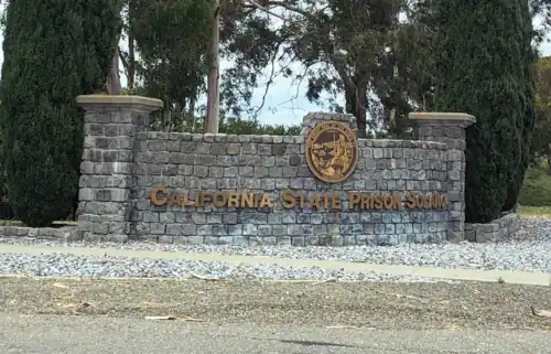 Prison sign with California state seal