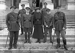 Members of the Legislative Assembly serving in the First World War in 1918. MacAdams in the middle of the front row.