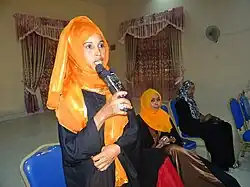 Image 10Somali woman in Hargeisa opening speech with traditional greeting. (from Culture of Somalia)