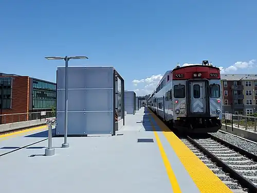 A train at an elevated urban railroad station