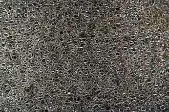 Macro photograph of the porosity in a synthetic cleaning sponge