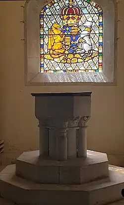 Baptistry: C13 font; stained glass probably c.1830