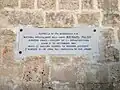 Plaque uncovered after the damaged parts were rebuilt and the chapel was reopened to the public[3]