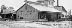 Stamps Ice & Fuel Company and a boxcar of the Louisiana and Arkansas Railway, c. 1904