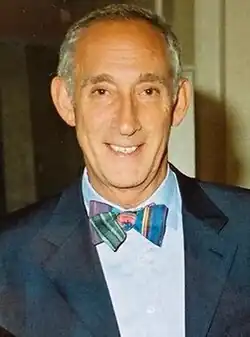 Stanton wearing a colourful bowtie