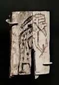 Vassal subject with headdress and spotted robe, possibly a Lybian, paying homage. First Dynasty, 2960–2770, Tomb of Menes B17, Abydos.[16][17]
