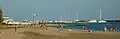 The beach with the marina in the background