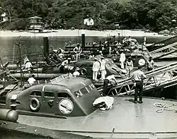 PT-46 (No. 1); PT-40 (No. 9); PT-61; PT-48 (No. 3) and PT-45 (No. 2) during commissioning ceremonies at the newly established PT Boat Base Taboga Island on 1 August 1942. To mislead possible Japanese spies in Panama, and presumably German agents in New York, the hull numbers displayed on the cabins were changed. The eleven boats of Motor Torpedo Boat Squadron Two were numbered 0 - 10.
