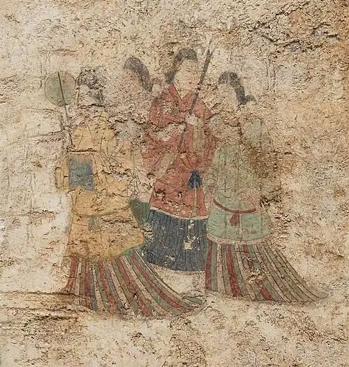 Women's dress under Goguryeo influence, with overlapping collar and mo skirt.[6] (Takamatsuzuka Tomb, 7th century)