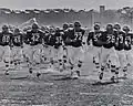 Parsons College football team taking the field at dedication game, October 8, 1966 vs. Los Angeles State