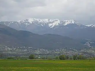 A mountain in the distance.