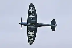 Supermarine Spitfire PR Mk.XI PL983 wearing 'THANK U NHS' on the underside of its wings