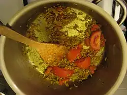 Step 4—Biryani Masala, frying onion, spices and tomatoes