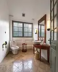 Toilets with wall telephone in Amantaka Suite.