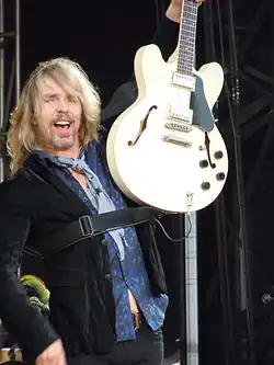 Shaw performing with Styx in 2010