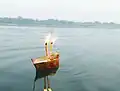 Boat floating on the river during the festival