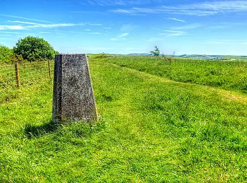 Trig Point on Kithurst Hill West Sussex located on the South Downs Way above the village of Storrington, 213 metres (699&nbsp;ft) high at the summit.
