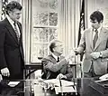 U.S. President Jimmy Carter (center) with Ted Kennedy (left) and Paul Tsongas signs the creation of Lowell National Historical Park, 1978