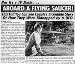 A newspaper clip with the headline stating "Now It's a TV Movie... Aboard A Flying Saucer! This Fall You Can See Couple's Incredible Story Of How They Were Kidnapped by a UFO". The article includes photo of Estelle Parsons as Betty Hill and James Earl Jones as Barney Hill.