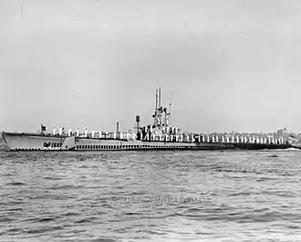 Threadfin's sailors line the deck, possibly at the naval base at Staten Island, N.Y., 22 September 1945.