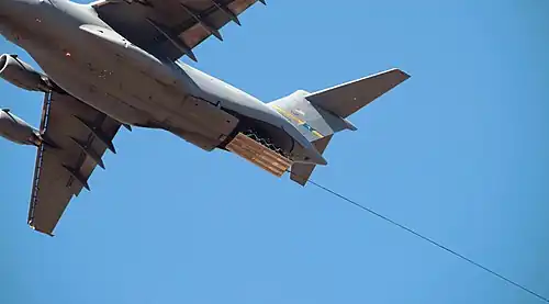 A C-17 airdropping an LAV-25A2