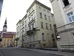 Niepodległości Street with the town hall in the background