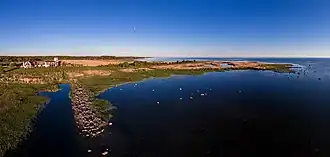 Sea coast at Rannaküla with the Varbla Holiday Village resort in the background