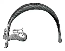 Central and outer brow dragon heads on the Vendel I helmet (580–630)